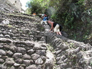 Coming down the steep stone steps.
