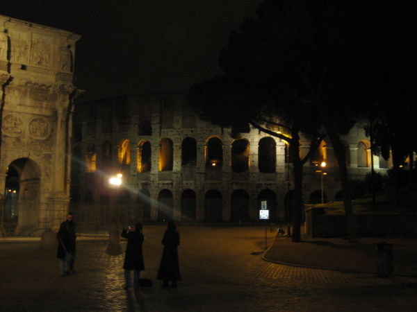 the colosseum next to arch