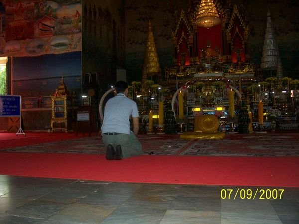 Nic praying in temple