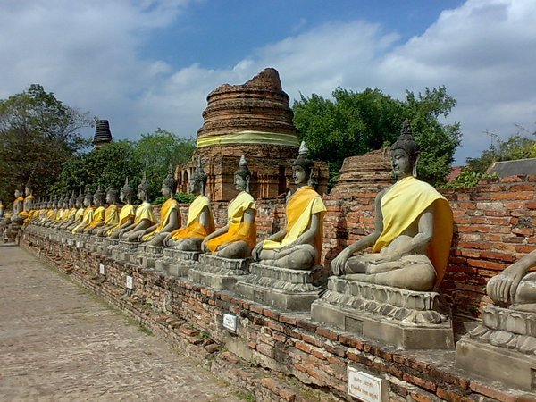 In this outer courtyard, rows of Buddha watch over