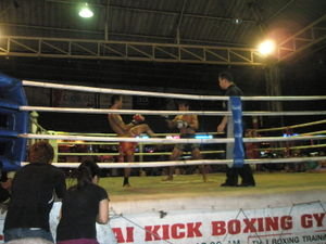 At the Muay Thai boxing match...