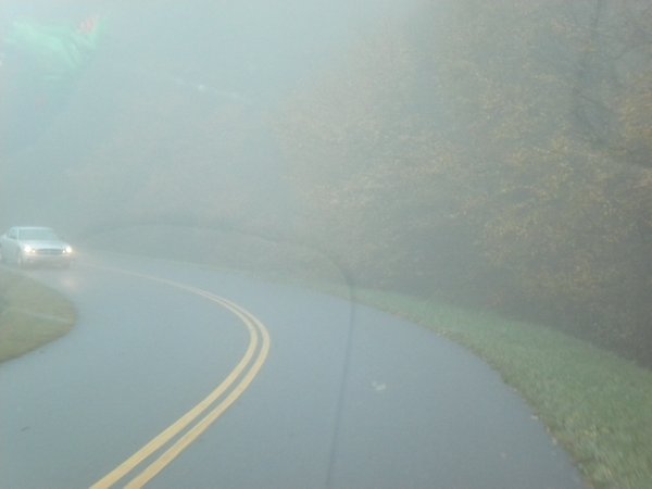 Driving up in the foggy mountains