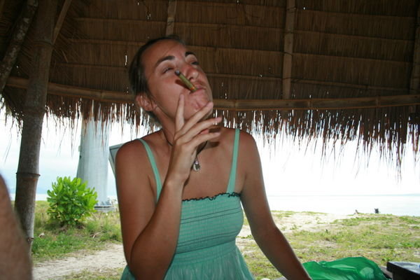 Clover enjoys a paradise cigar.