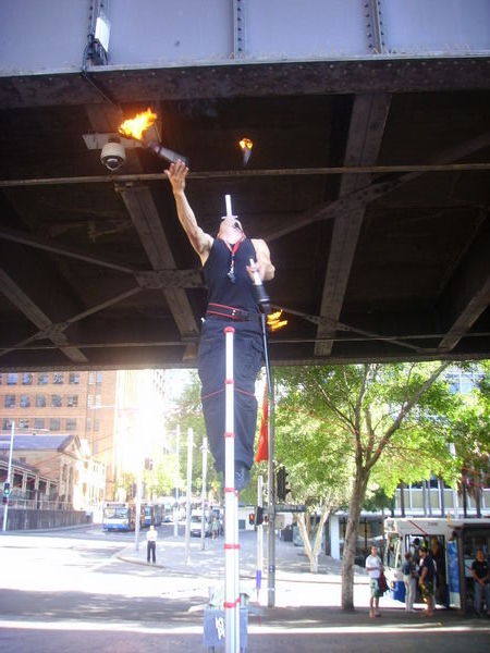 Swallowing a sword while juggling fire on a ladder