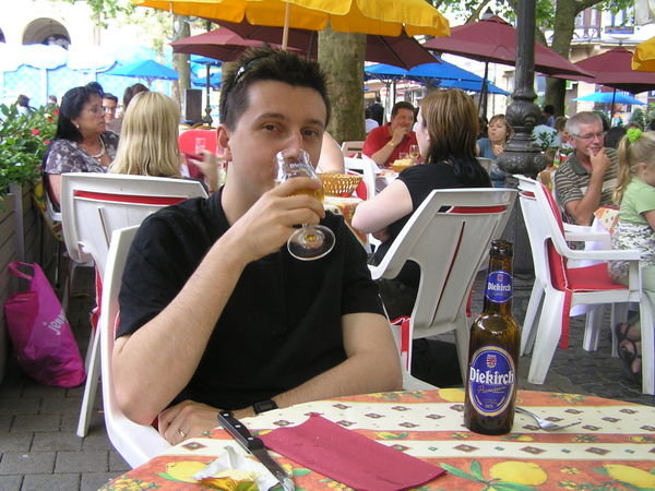 Ross enjoys a drink in the main square