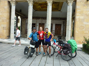 Outside Stalin's museum with two Ukrainian cyclists