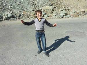 Tajik lad performing a dance