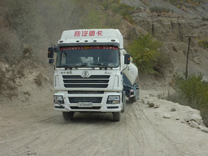 Lorries doing a bit of cross-country along the Pamir Highway