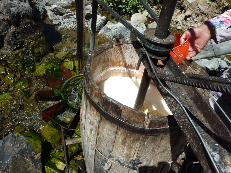 Yoghurt being made in a wooden barrel 