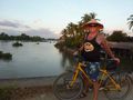 Cycling across the Railway bridge from Don Khon to Don Det