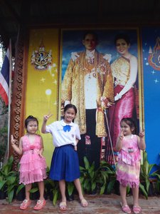 Children in front of King and Queen's portrait