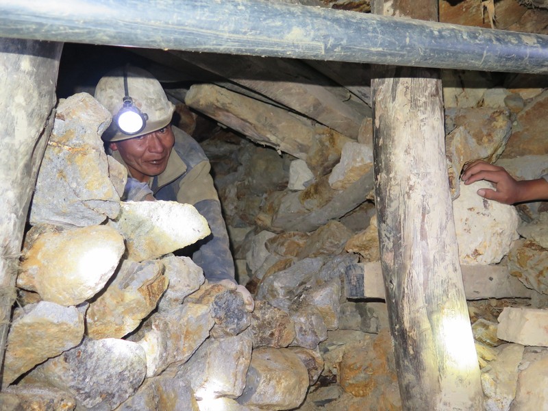 A miner coming to greet us from his mine shaft