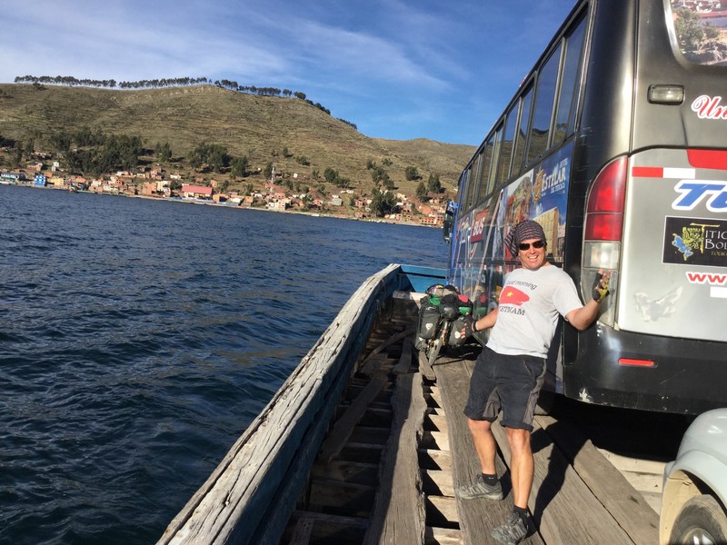 Crossing Lake Titicaca with our bikes and a bus on a barge