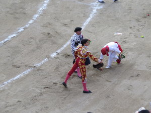 Matador parades around the arena after his bull fight