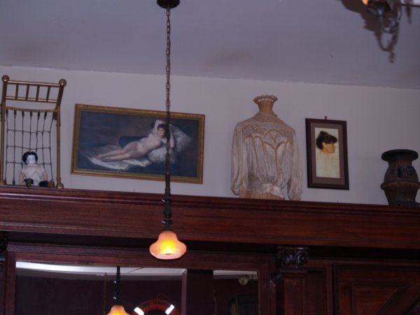 Pictures and artifacts over the bar