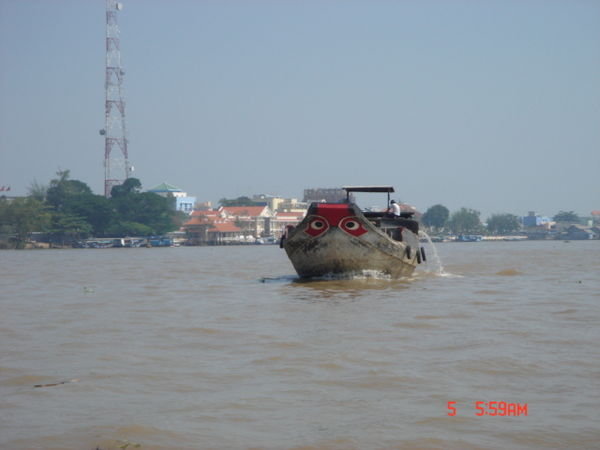 Een van de vele bootjes op de Mekong River.