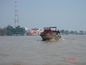 Een van de vele bootjes op de Mekong River.