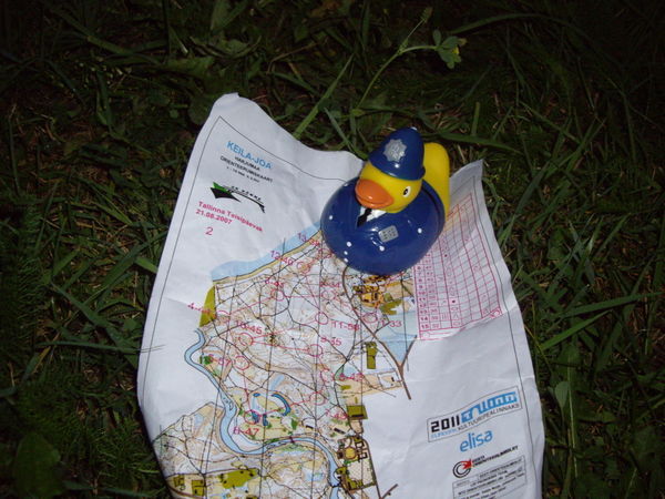 Duckie with our orienteering map (we were too tired to pose for the picture)