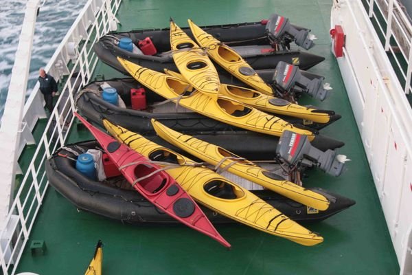 Sea kayaks at rest on deck