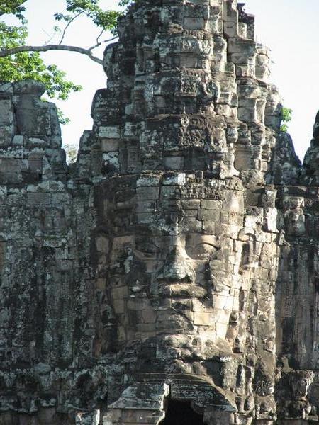 Giant heads atop the gate to Angkor Thom