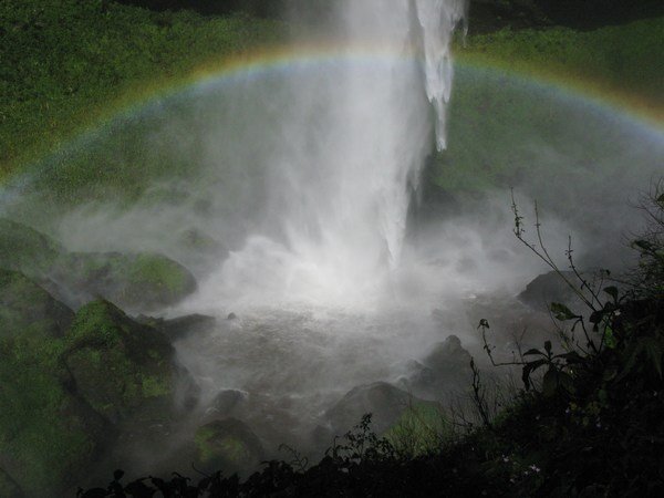 Rainbow at the bas of Sipi Falls