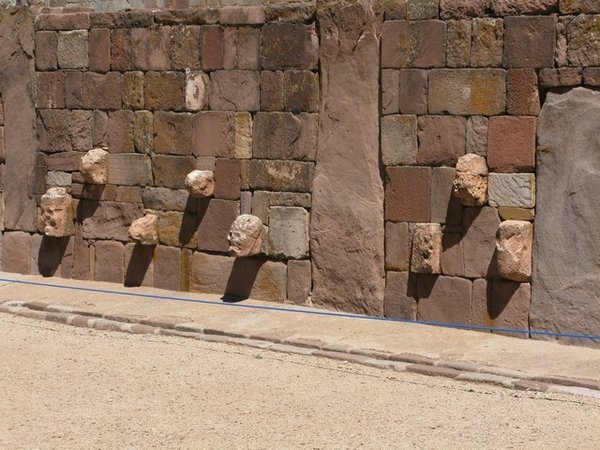 Stone heads buried in the walls of the subterranean temple, Tiwanaku