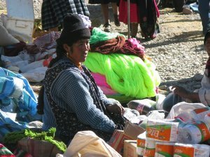 Market day by the jetty, Amantani