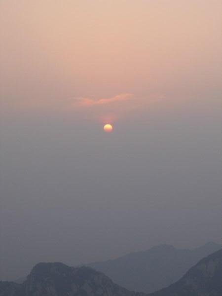 Sun rising over the smog...