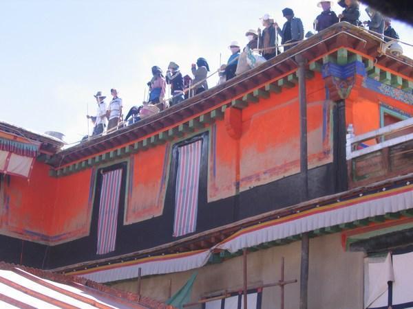 Gang workers on the roof of the Potala...