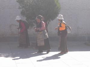 Tibetan ladies leaving the monastery after completing a kora... I followed them round for the last part of it