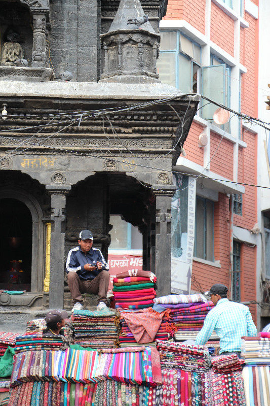 Kathmandu Old City - selling from a shine.. does that help sales?