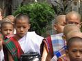 Novice monks lining up for food