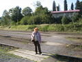 Mum, looking rather hapless, on the train tracks