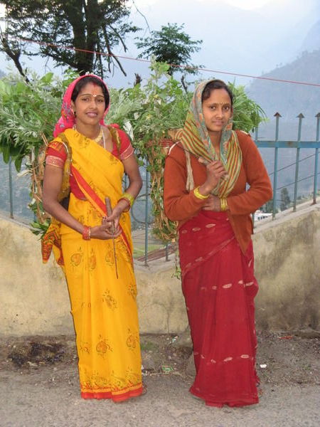 Two mountain women return from the fields