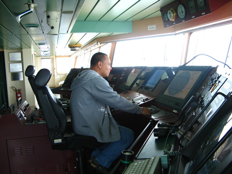 Second Officer Rogelio Cartagena on the Navigation Bridge