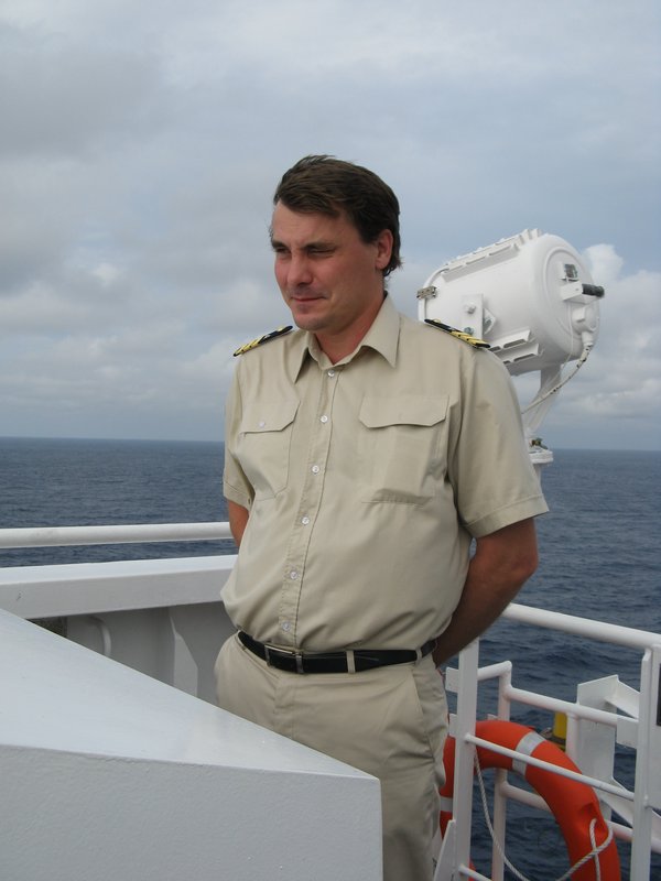 Michael Gogolkiewicz desperately trying not to laugh because he is wearing his uniform on the Atlantic Ocean