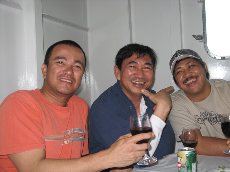 Crew members, including chef Huberto Ompoc (middle)
