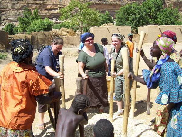 Us pounding millet with the local women in Kani-K