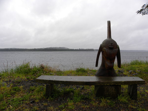 Mini-totem on a bench in Old Massett