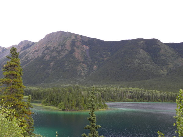 The emerald colour of Good Hope lake on the Stewart-Cassiar