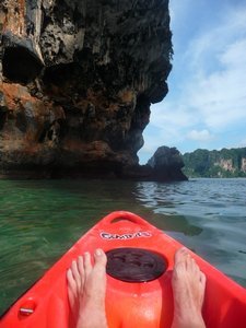 Paddling through Ton Sai Bay with my sunburnt feet in the forground