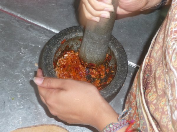 Ammi making red curry paste