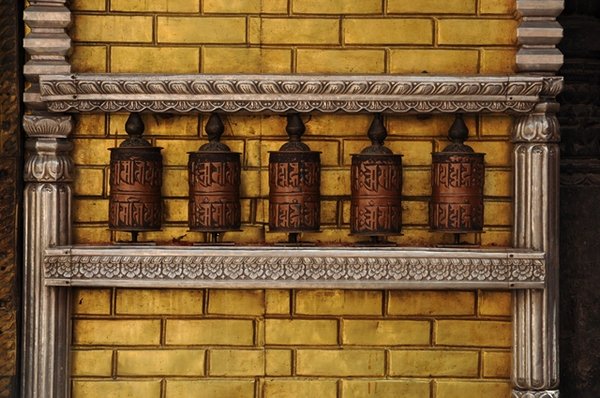 Prayer wheels and gold bricks