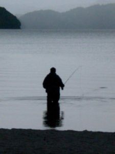 Pescador en le lago de Rotorua