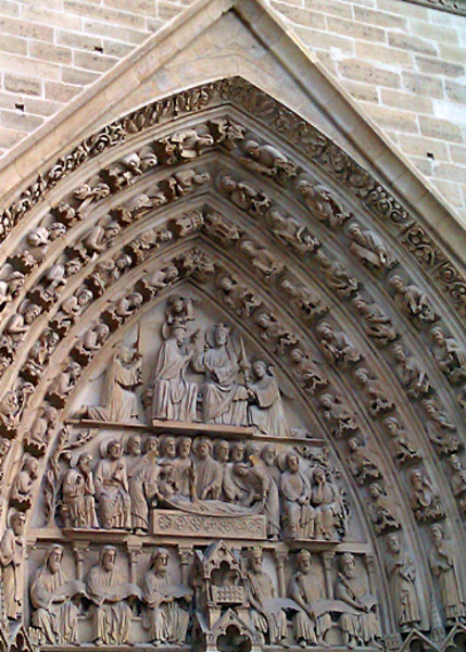 Magnificant Carvings above the West Door of Notre Dame