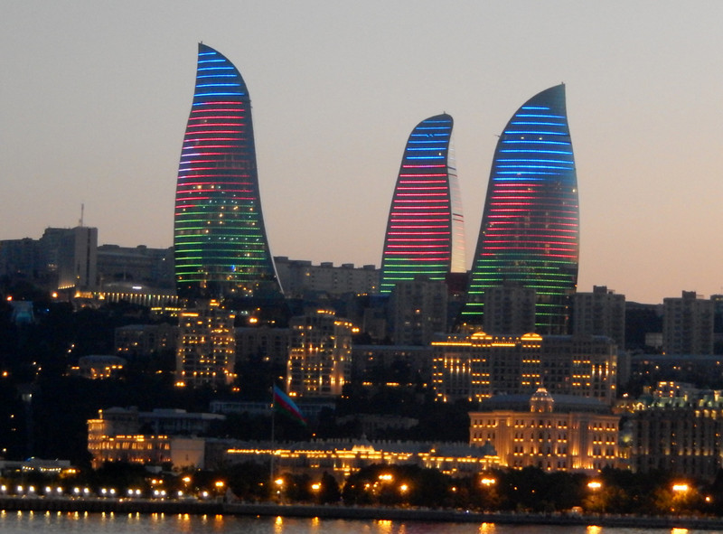 Flame Towers showing the national flag colours
