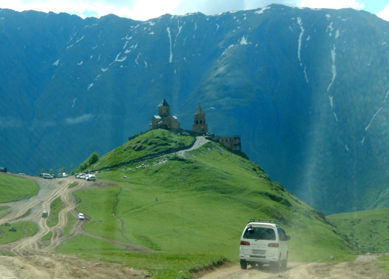 Kazbegi Alpine Walk with church at the summit
