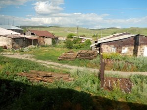 Typical country village in Armenia as taken from the train