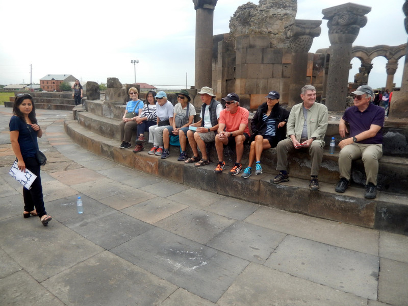 ... and the veteran tourists listen to the guide