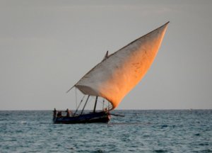 The glow of sunset on a dhow